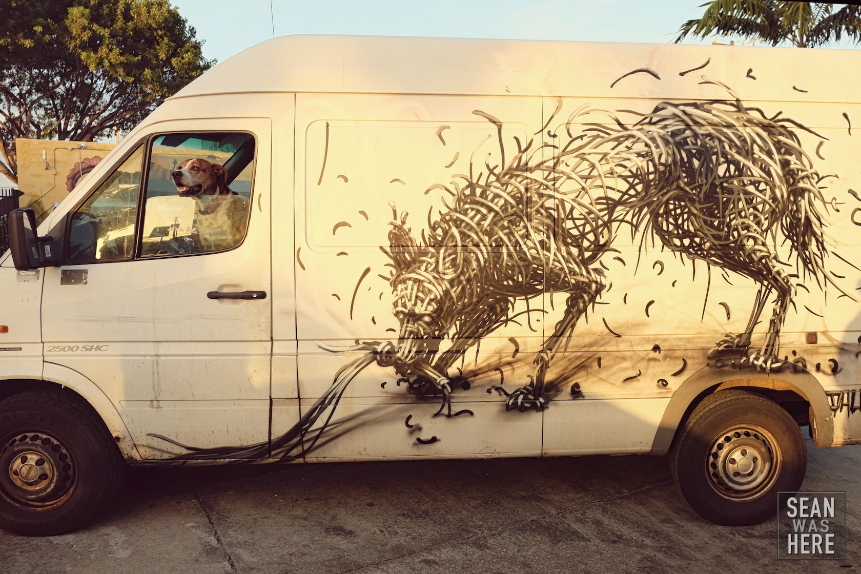 DALeast (left) painted this van in NYC over the summer. Todd (owner) drove down from NYC for art basel. Todd: "Yea I'm not sure how long I'll stay in town since I have a place here". Me: "Oh you live nearby??" Todd: "I live in this van!” Wynwood Miami